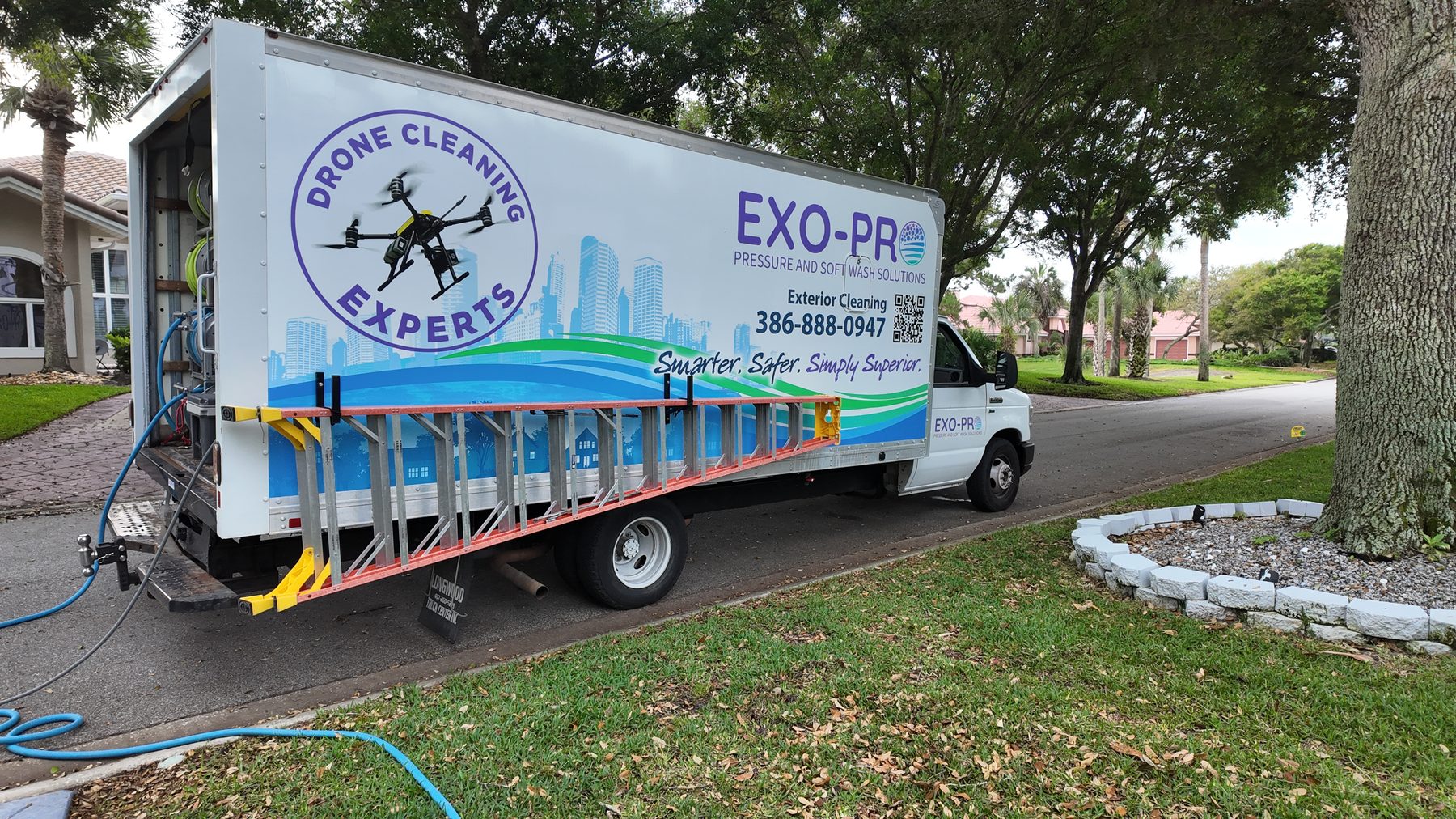 The Exo-Pro drone cleaning truck, wrapped and equipped for exterior cleaning
